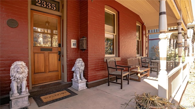 2335 Stout St, Denver, CO 80205 - view of exterior entry featuring covered porch