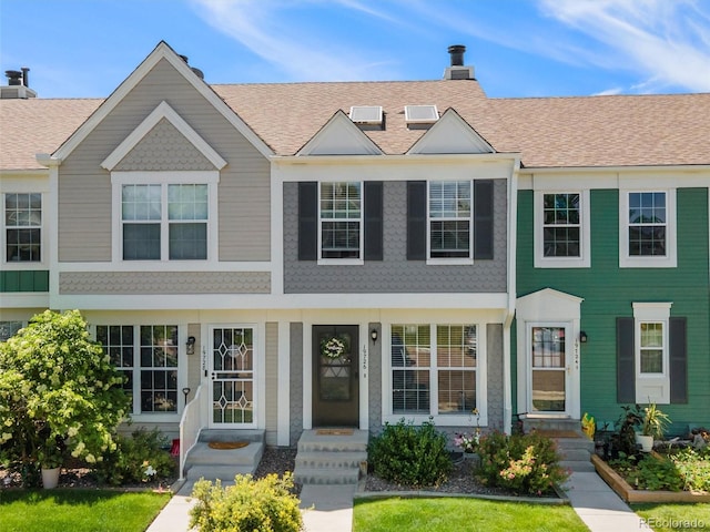 19726 Applewood Ct, Parker, CO 80138 - townhome / multi-family property featuring a chimney