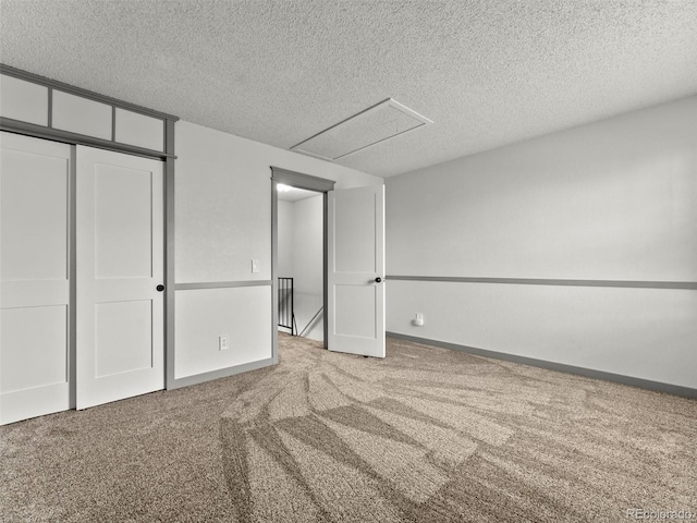 19726 Applewood Ct, Parker, CO 80138 - unfurnished bedroom with a textured ceiling, carpet, and a closet