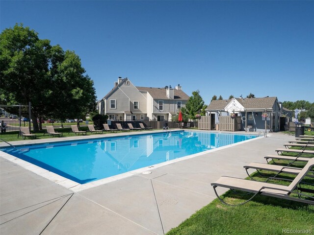19726 Applewood Ct, Parker, CO 80138 - community pool featuring a patio area