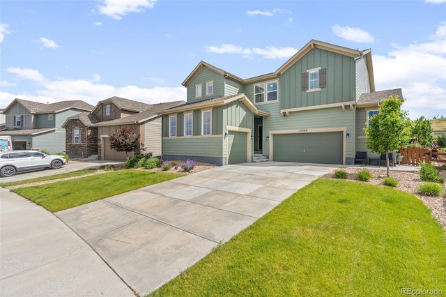 17880 W 94th Dr, Arvada, CO 80007 - view of front of house with board and batten siding, an attached garage, and concrete driveway