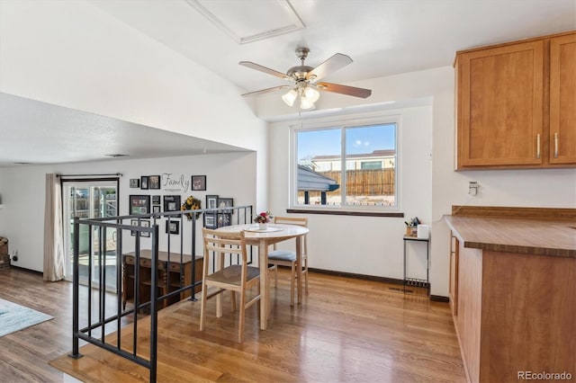 dining room with plenty of natural light and wood finished floors