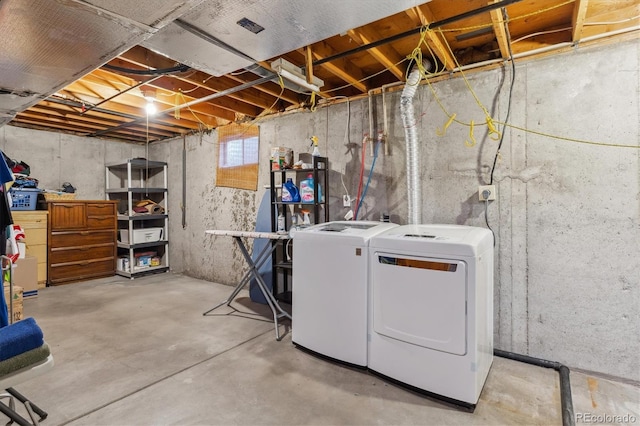 interior space with washing machine and dryer and laundry area