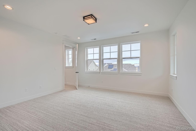 view of carpeted spare room