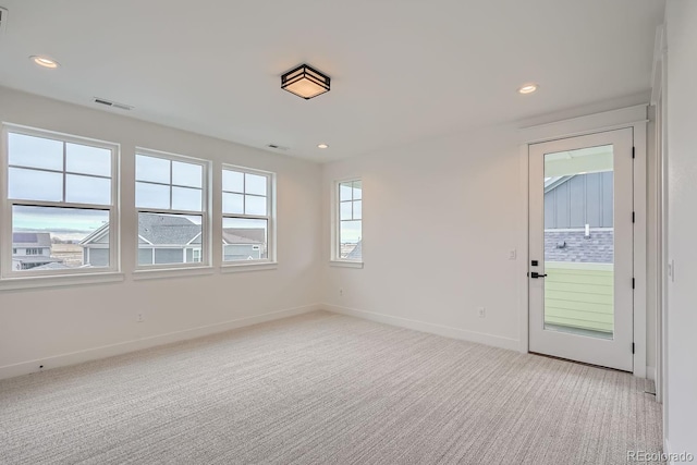 view of carpeted spare room