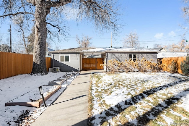 view of snow covered house