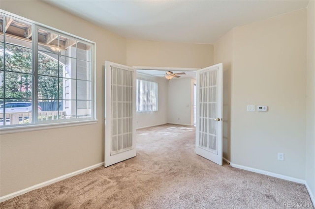 4222 S Blackhawk Cir Unit 6G, Aurora, CO 80014 - carpeted empty room with french doors, baseboards, and ceiling fan