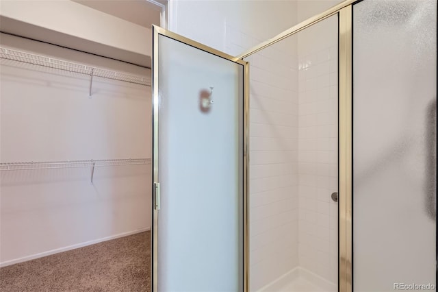 4222 S Blackhawk Cir Unit 6G, Aurora, CO 80014 - full bath with a shower stall and a spacious closet