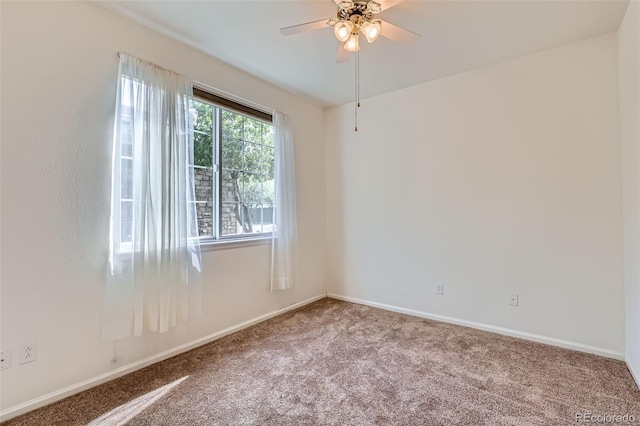 4222 S Blackhawk Cir Unit 6G, Aurora, CO 80014 - unfurnished room with carpet flooring, a ceiling fan, and baseboards