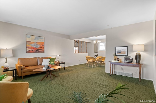 living room with baseboards, carpet flooring, visible vents, and a notable chandelier