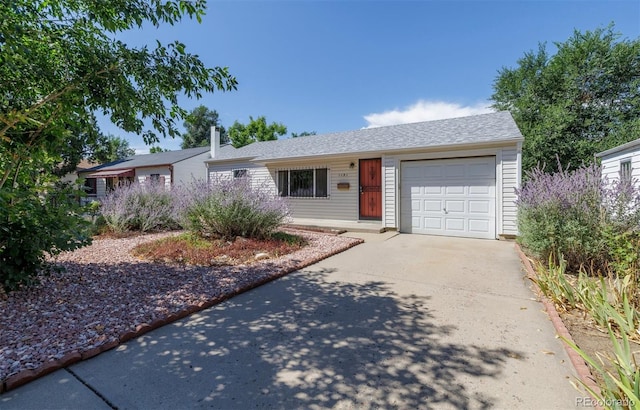 ranch-style home with a garage