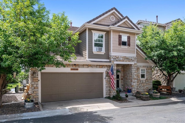 craftsman inspired home with a garage