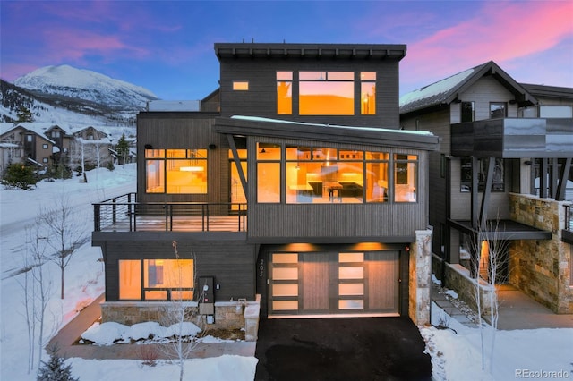 exterior space featuring a mountain view and a garage