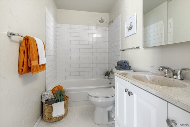 full bath with vanity, tile patterned floors, toilet, and shower / bath combination