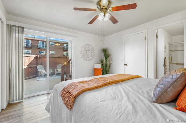 bedroom featuring access to exterior, light wood-style flooring, and ceiling fan