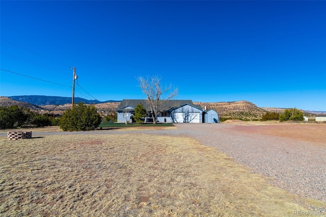 exterior space featuring a mountain view