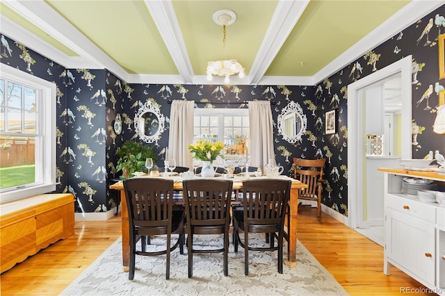 7835 Valley View St, Louviers, CO 80131 - dining space with wallpapered walls, a chandelier, light wood-style flooring, beamed ceiling, and baseboards