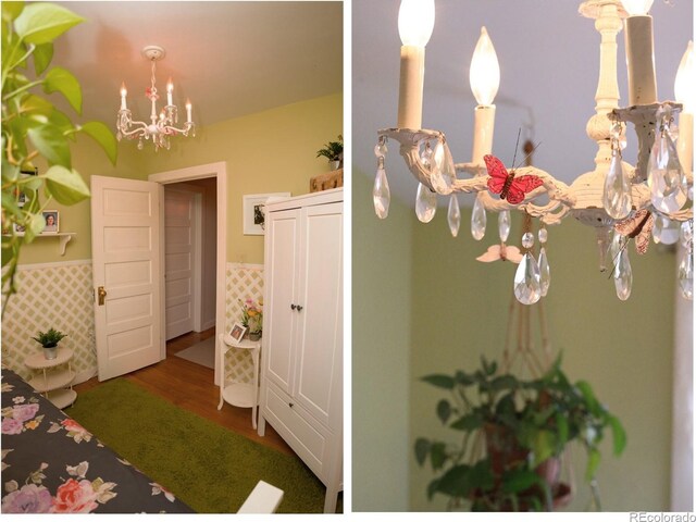 7835 Valley View St, Louviers, CO 80131 - bedroom featuring a chandelier, a wainscoted wall, and wood finished floors