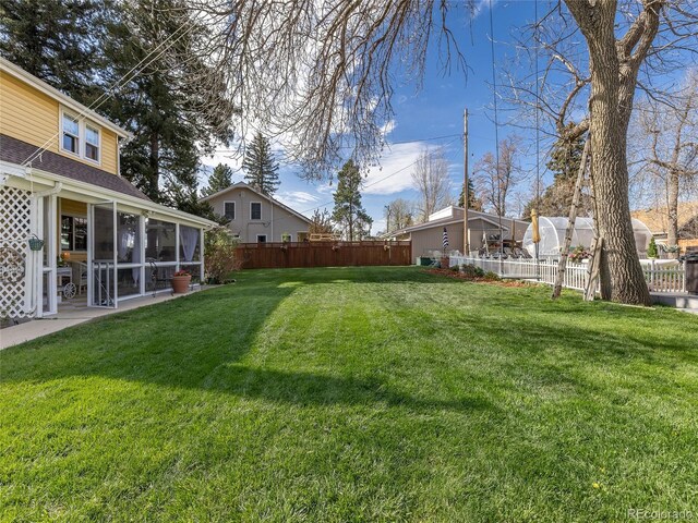 7835 Valley View St, Louviers, CO 80131 - view of yard featuring a sunroom