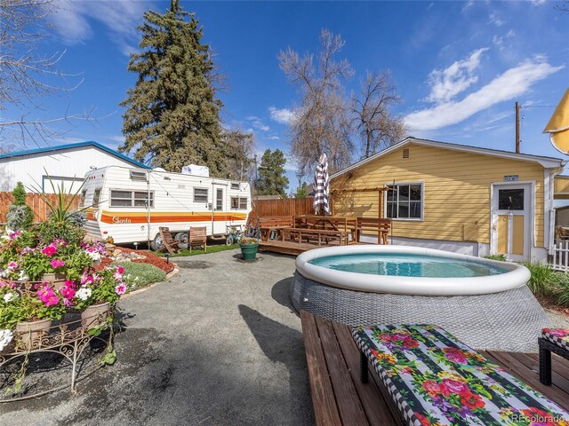 7835 Valley View St, Louviers, CO 80131 - view of swimming pool featuring a wooden deck