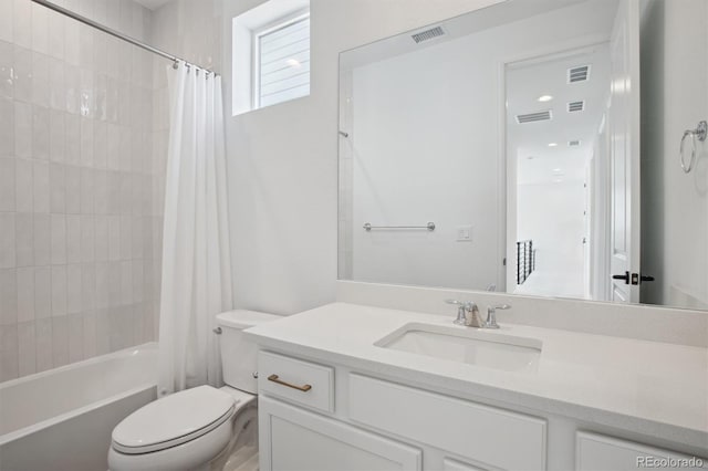 bathroom featuring toilet, vanity, shower / bath combination with curtain, and visible vents