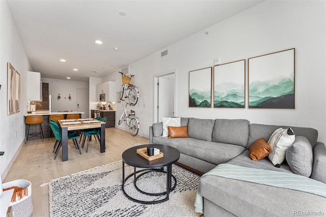 living room featuring light wood-type flooring