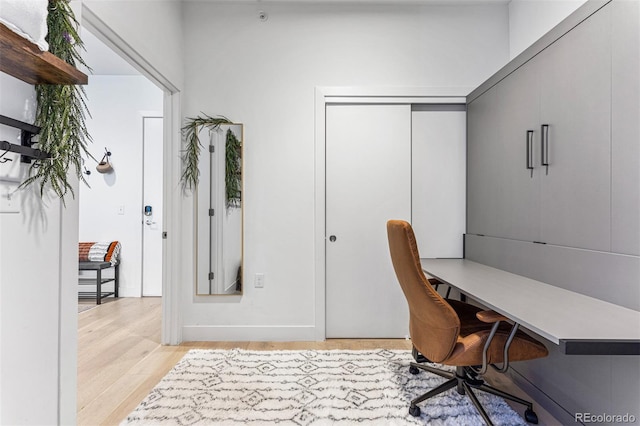 office area with light wood-type flooring