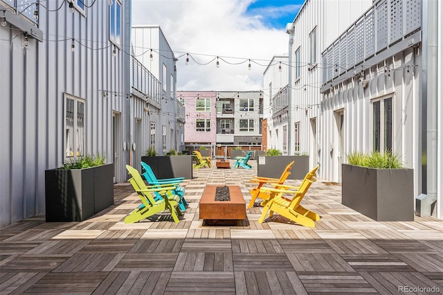 view of patio with a fire pit