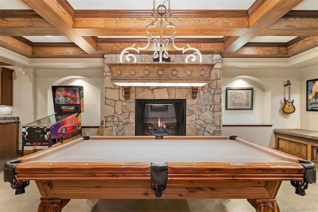 rec room featuring pool table, beamed ceiling, coffered ceiling, and a fireplace