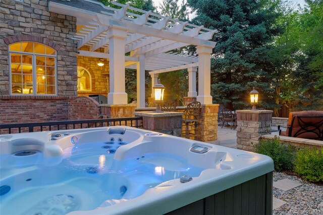 view of patio / terrace featuring a hot tub