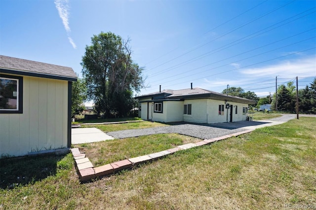 16707 W 10th Ave, Golden, CO 80401 - rear view of house featuring a yard and a patio area