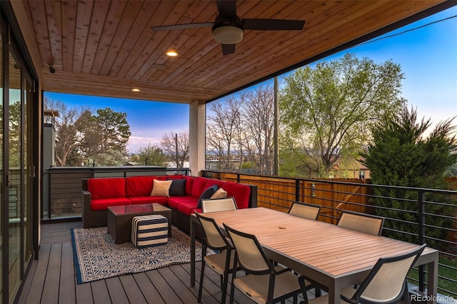 deck featuring an outdoor living space, ceiling fan, and outdoor dining space