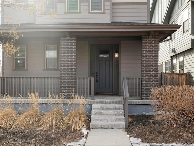 entrance to property with a porch