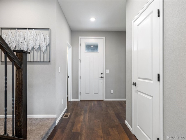 interior space with dark hardwood / wood-style flooring