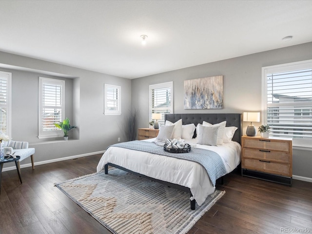 bedroom featuring dark hardwood / wood-style floors