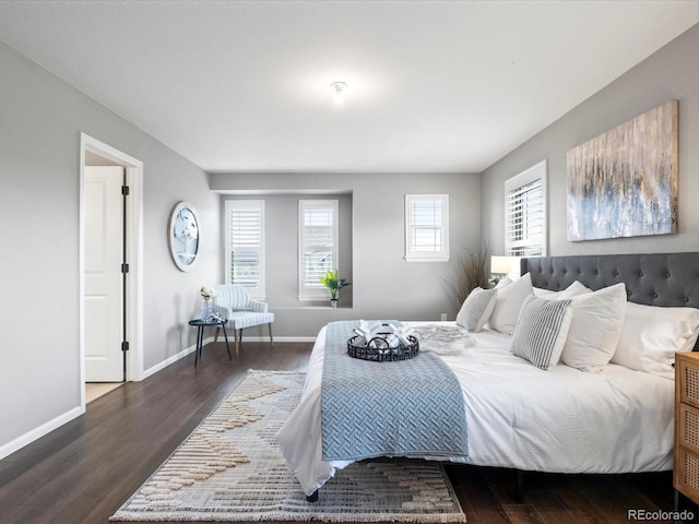 bedroom featuring dark hardwood / wood-style floors