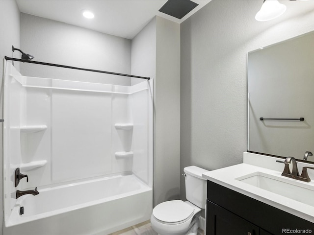 full bathroom with vanity, bathtub / shower combination, and toilet