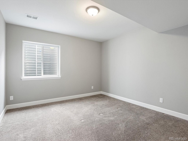 view of carpeted spare room