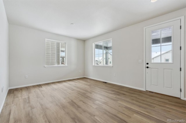 interior space with light hardwood / wood-style floors