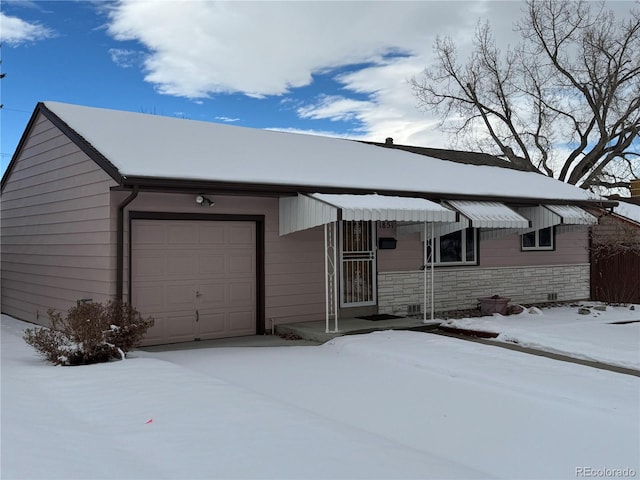 view of front of home with a garage