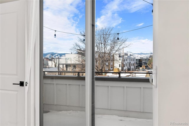 balcony featuring a mountain view