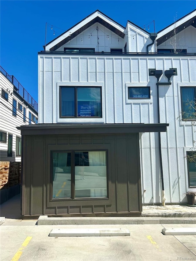 3955 W 13th Ave, Denver, CO 80204 - exterior space featuring board and batten siding