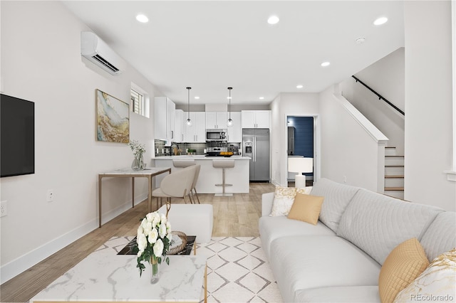 3955 W 13th Ave, Denver, CO 80204 - living area featuring recessed lighting, stairway, and an AC wall unit