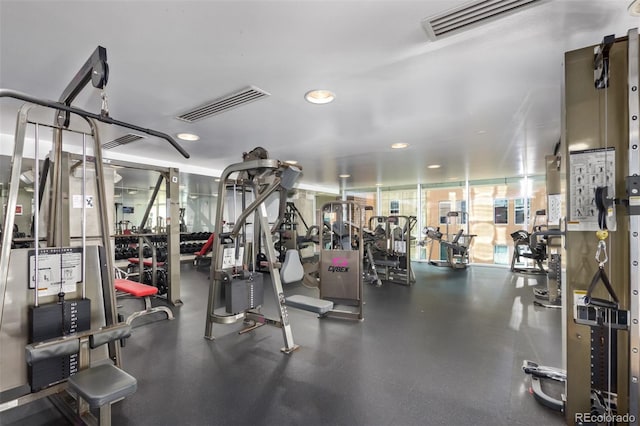 exercise room featuring visible vents