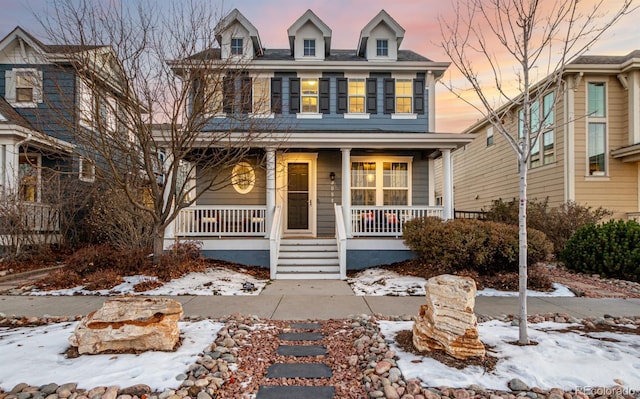 view of front of house featuring covered porch