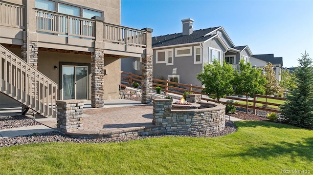 1871 Walnut Creek Ct, Colorado Springs, CO 80921 - view of patio / terrace featuring a fire pit, stairway, and a deck