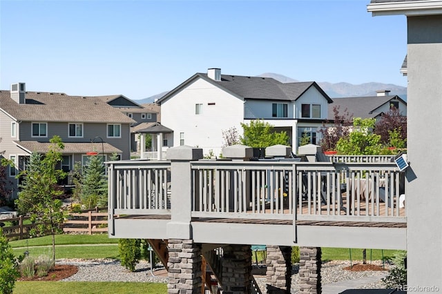 1871 Walnut Creek Ct, Colorado Springs, CO 80921 - back of property featuring a residential view and a deck with mountain view