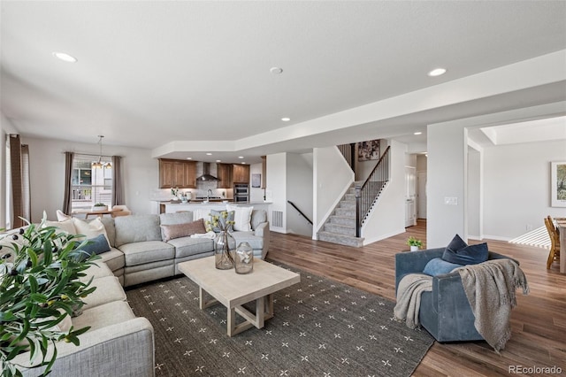1871 Walnut Creek Ct, Colorado Springs, CO 80921 - living area with stairs, wood finished floors, recessed lighting, and a chandelier