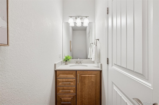 1871 Walnut Creek Ct, Colorado Springs, CO 80921 - bathroom with a textured wall and vanity