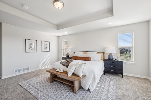 1871 Walnut Creek Ct, Colorado Springs, CO 80921 - bedroom with light carpet, multiple windows, a tray ceiling, and recessed lighting